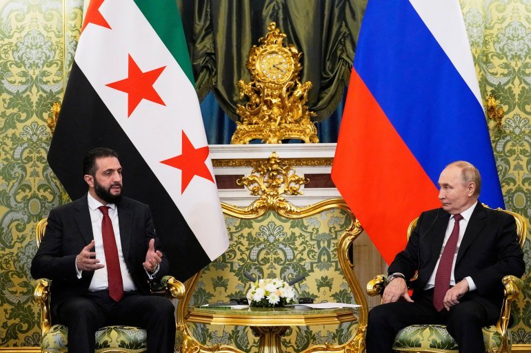 Russia's President Vladimir Putin and Syria's President Ahmed al-Sharaa speak during a meeting at the Kremlin in Moscow, Russia, October 15, 2025. Alexander Zemlianichenko/Pool via REUTERS