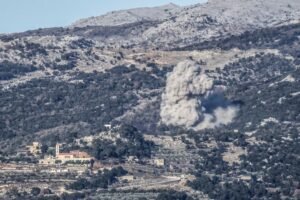 Smoke rises from the site of an Israeli airstrike that struck the hillsides near the southern Lebanese village of Al-Katrani on January 11, 2026.