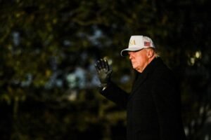U.S. President Donald Trump waves as he arrives on the South Lawn of the White House in Washington, D.C., U.S., February 1, 2026.