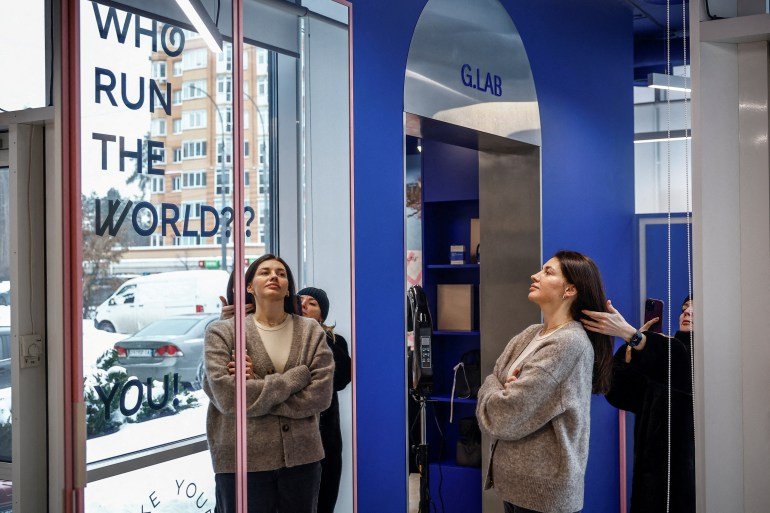 Iryna, a beauty salon manager, participates in the recording of a video for the salon&rsquo;s social media as it continues operating despite frequent power outages after recent Russian missile and drone strikes damaged critical infrastructure, amid Russia&rsquo;s attack on Ukraine, in Irpin, Kyiv region, Ukraine, February 6, 2026. REUTERS/Alina Smutko TPX IMAGES OF THE DAY