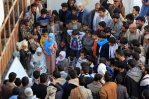 People gather around girls learning to recite the Holy Quran, ahead of the Muslim fasting month of Ramadan, at the Grand Mosque in Sanaa, Yemen February 3, 2026. REUTERS/Khaled Abdullah
