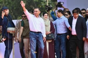 Bangladesh Nationalist Party (BNP) chairman Tarique Rahman (3L) waves to supporters during a rally as he begins campaigning ahead of the upcoming national election, in Sylhet on January 22, 2026.
