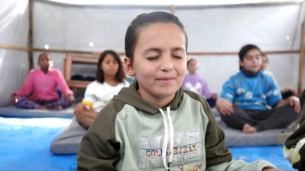 Yoga classes aim to bring moments of peace to Gaza’s traumatised children