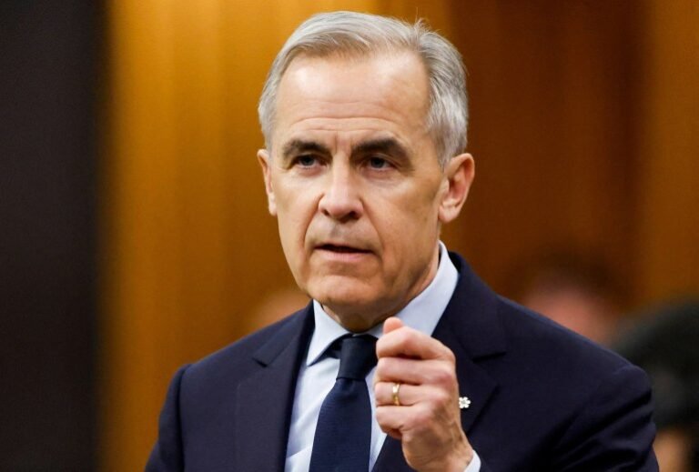 FILE PHOTO: Canada's Prime Minister Mark Carney speaks during Question Period in the House of Commons on Parliament Hill in Ottawa, Ontario, Canada, March 25, 2026. REUTERS/Patrick Doyle/File Photo