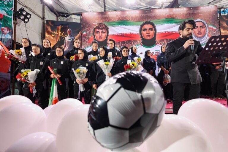 Iran footballers react.